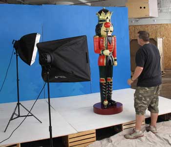 Eddie, Our warehouse manager, making sure that the Nutcracker King is positioned correctly